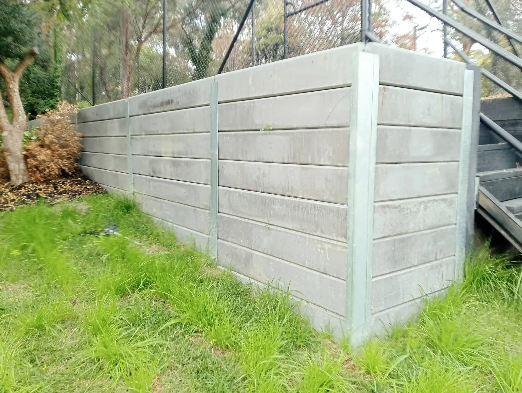 Completed concrete sleeper retaining wall